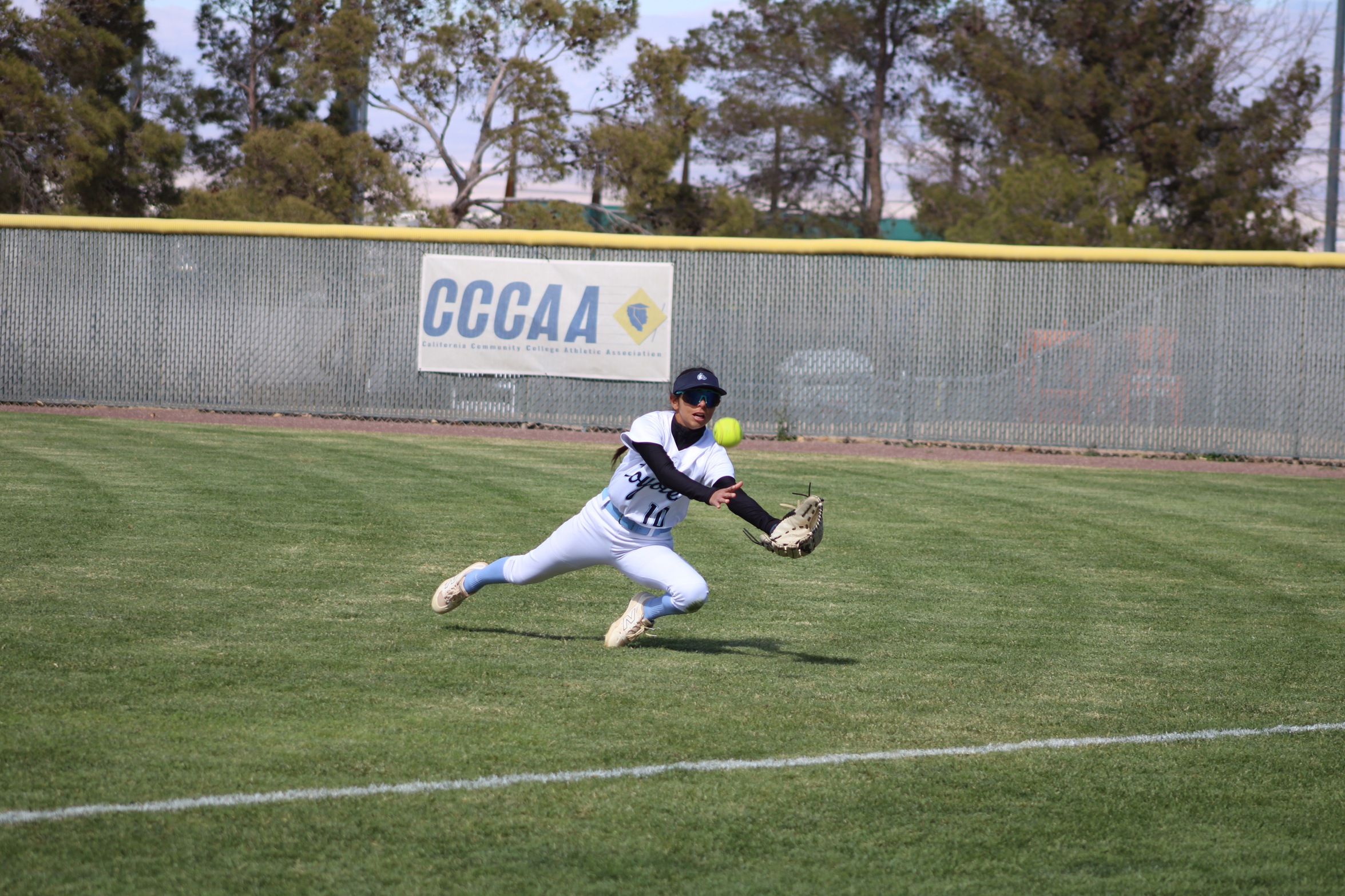 #10 Diana Lopez lays out for the catch