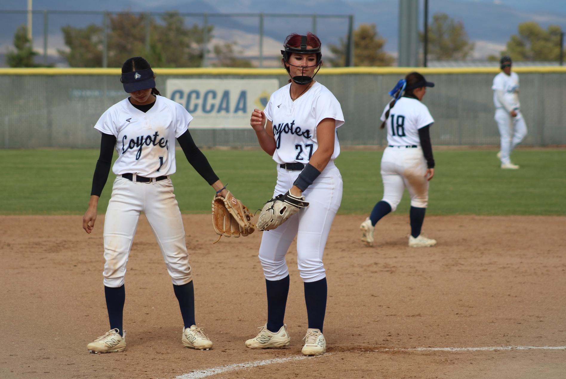 Erica Madrid and Rheanna Bell shake hands